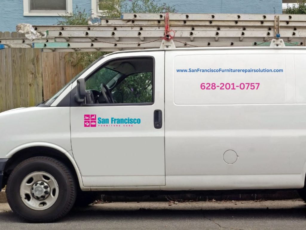 White utility van featuring pink and blue text: "San Francisco Furniture Repair & Refinish" with contact details on the side.